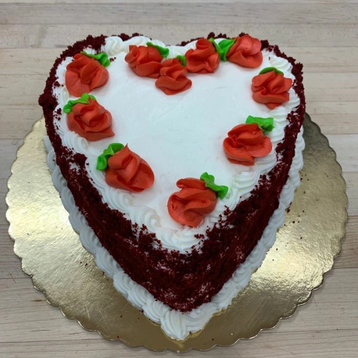 Red velvet heart cake with cream cheese frosting